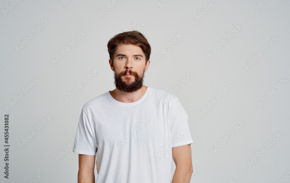 handsome bearded man in white t-shirt fashion studio handsome bearded man in white t-shirt fashion studio