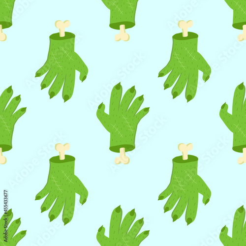 Cute green zombie hand vector halloween seamless pattern on a light blue background