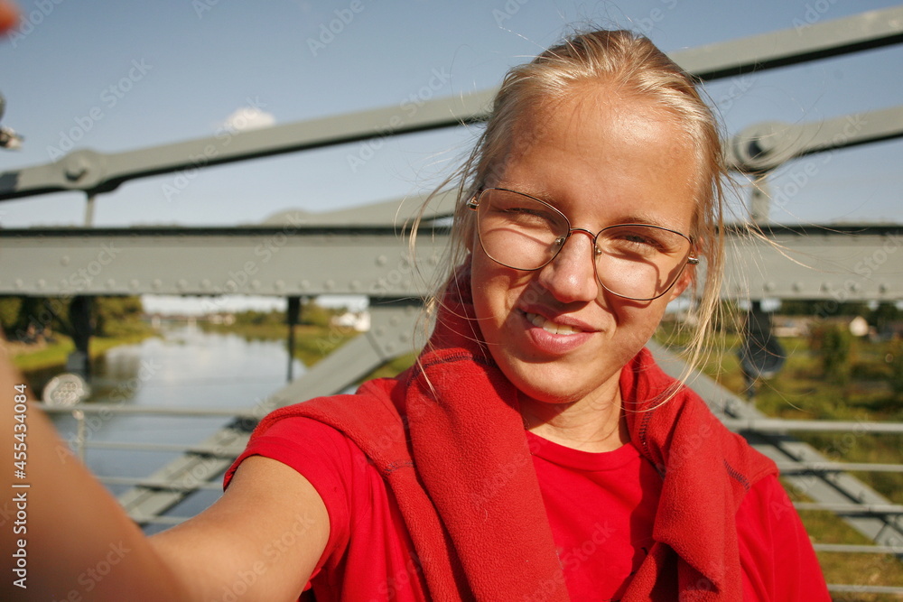 Young beautiful woman taking pictures of herself. Female pov Young beautiful woman taking pictures of herself. Female pov