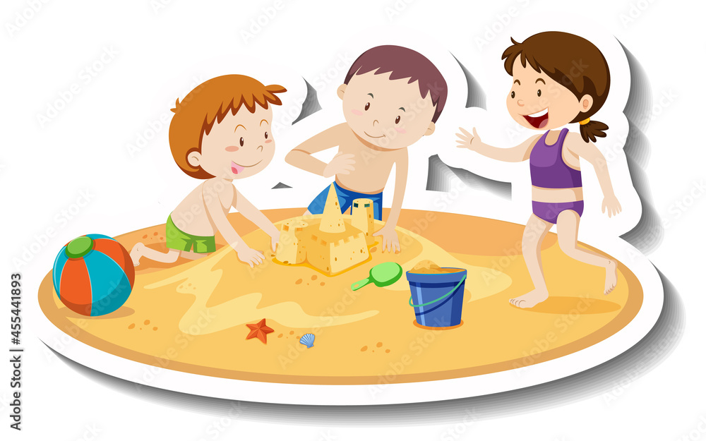 Children building sand castle at the beach Children building sand castle at the beach