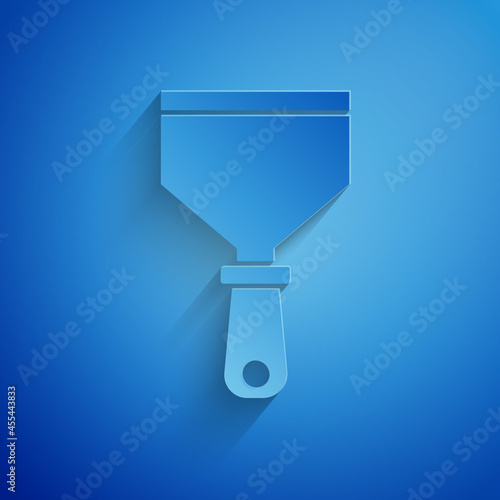 Paper cut Putty knife icon isolated on blue background. Spatula repair tool. Spackling or paint instruments. Paper art style. Vector