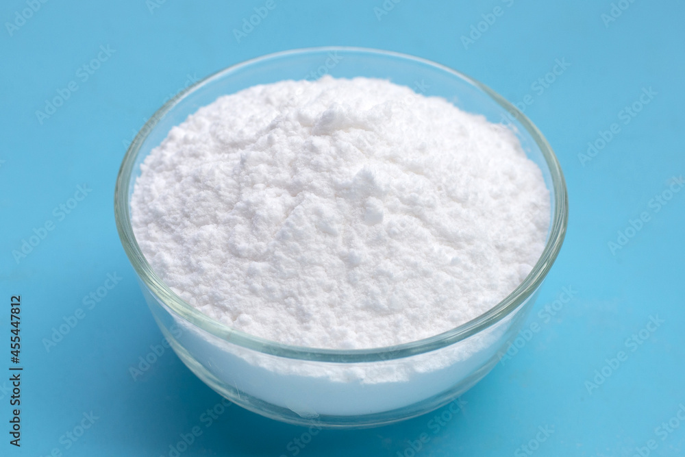 Baking soda on blue background. Baking soda on blue background.
