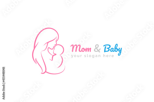 Mother and baby logo vector symbol. Mom hugs her child logo template