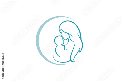 Mother and baby logo vector symbol. Mom hugs her child logo template