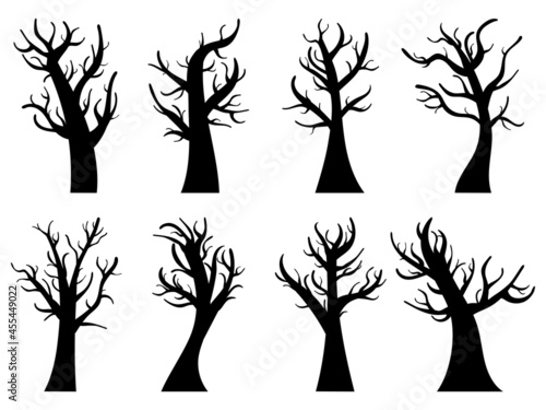 Autumn trees set isolated on white background. Silhouettes of trees without leaves. Bare trees. Design for posters, banners and promotional items. Vector illustration