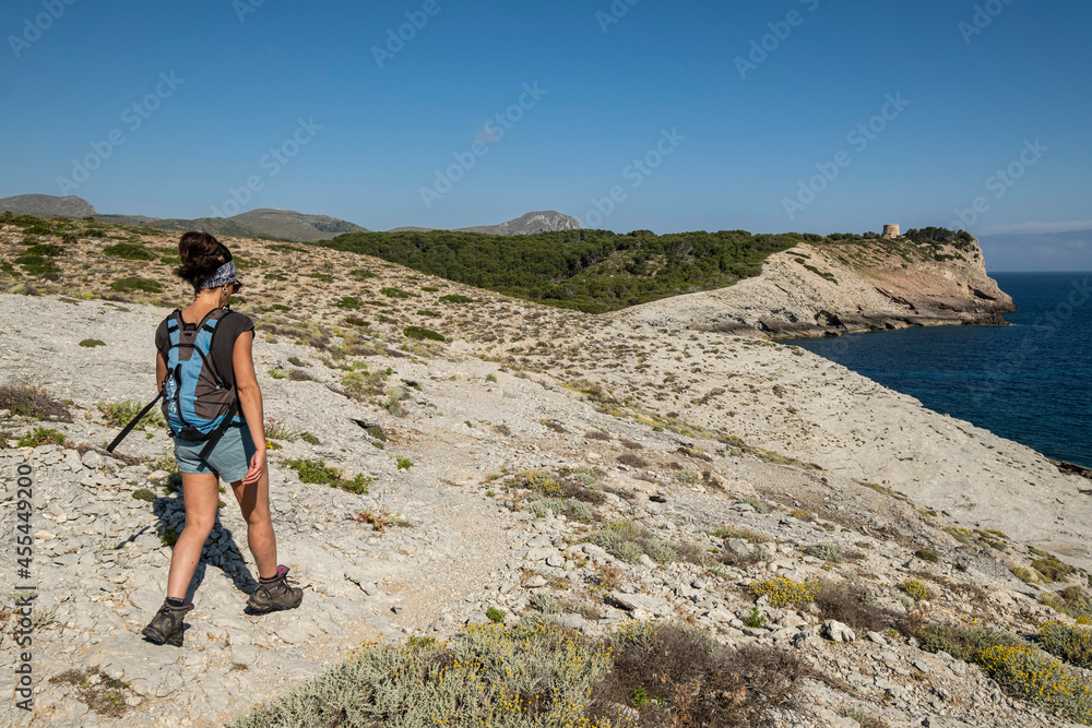 hikers in Cala Matzoc, Arta, Mallorca, Balearic Islands, Spain