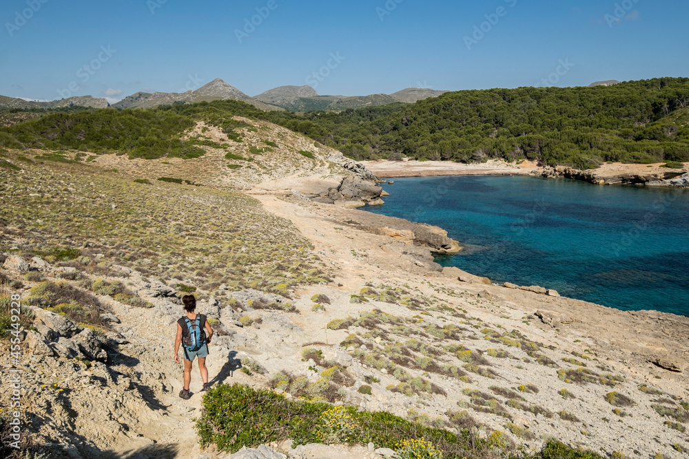 hikers in Cala Matzoc, Arta, Mallorca, Balearic Islands, Spain