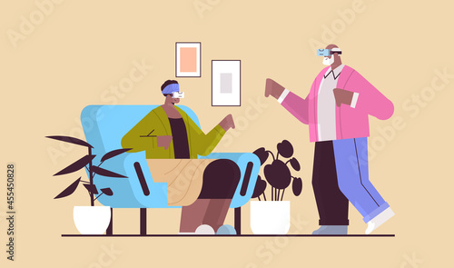 senior couple wearing vr headset grandparents in digital glasses exploring virtual reality interactive services active old age