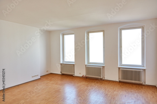 Empty large white room in apartment in old building