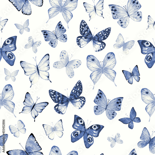 Seamless botanical summer pattern with indigo blue watercolor butterflies © Olga