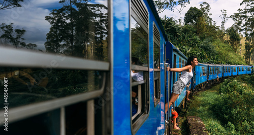 Cuadro en lienzo A tourist travels by train to beautiful places, a panorama