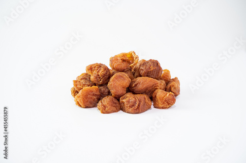 Dried longan isolated on white background. Dehydrated food isolated concept. 