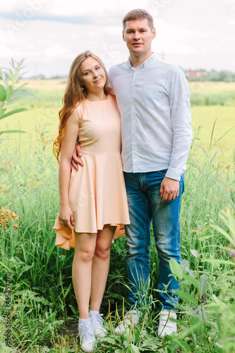 Beautiful couple hugging in...