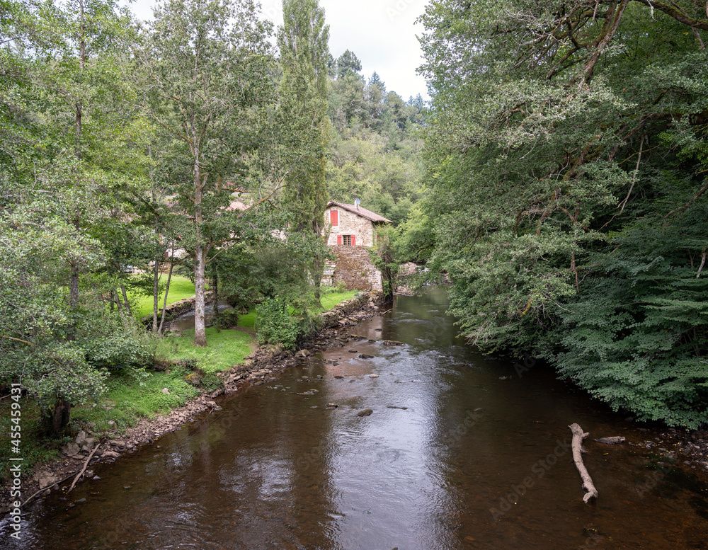 river vienne near limoges and st leonard with building of old watermill in france