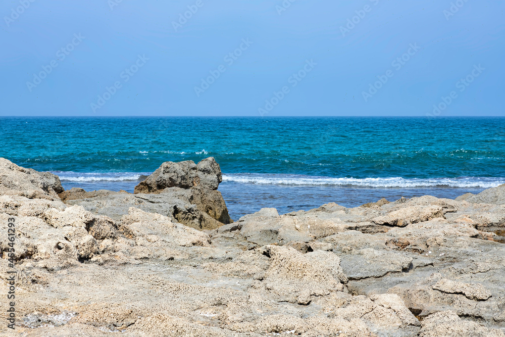 View of sandstone formations on the Mediterranean coast at low tide. Israel