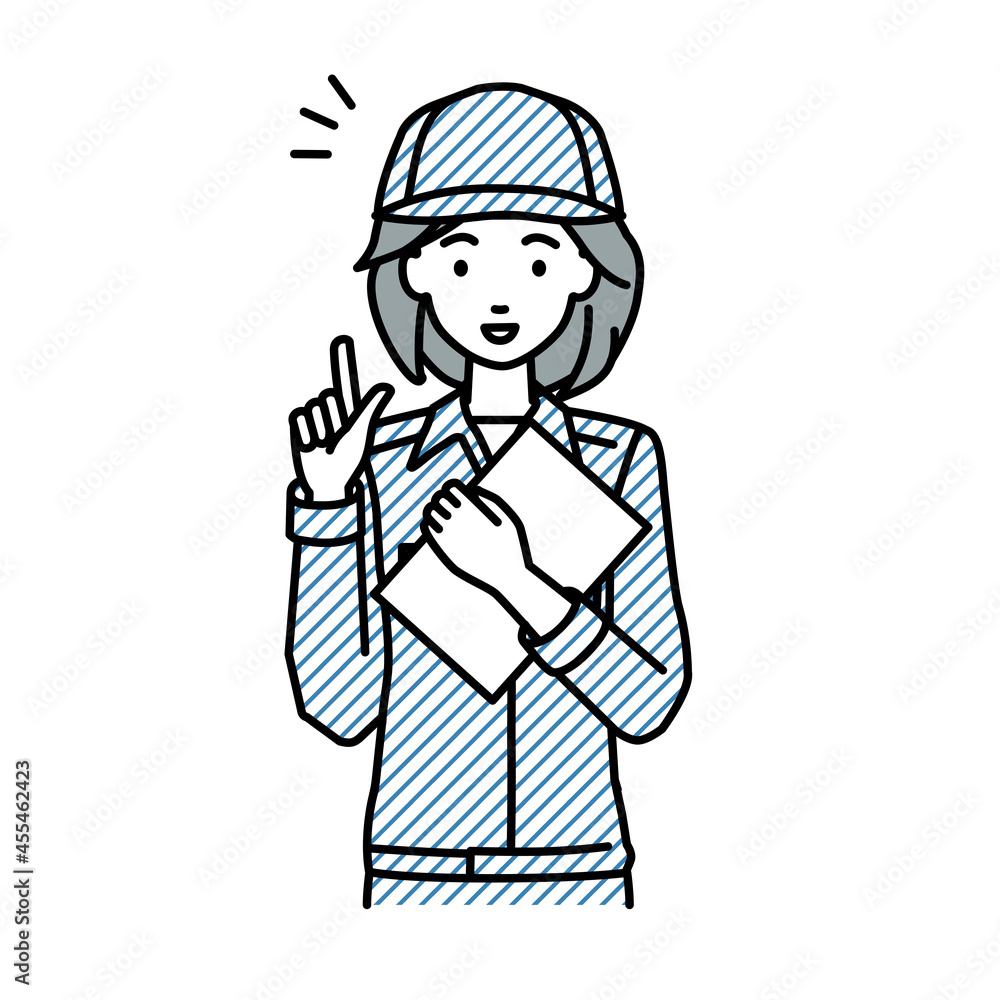 立って書類を手に持って何かひらめいた作業員の女性 立って書類を手に持って何かひらめいた作業員の女性