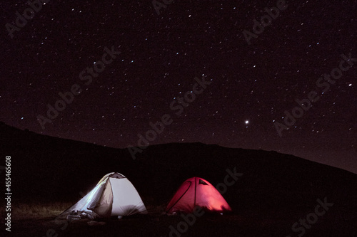 Tow tent under a dome of stars