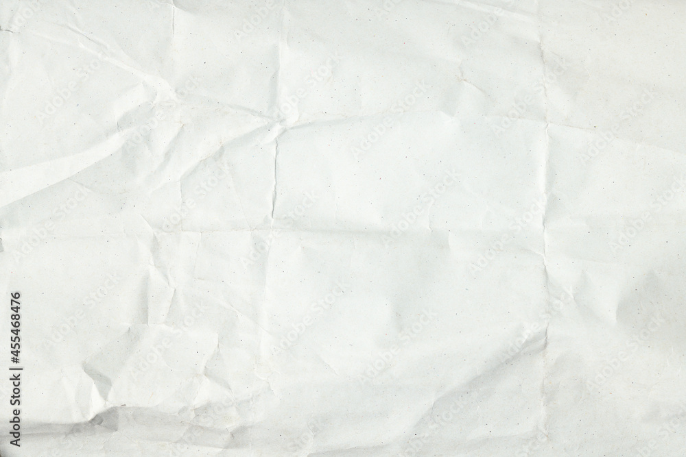 Fototapeta premium Texture of white crumpled wrapping paper. 