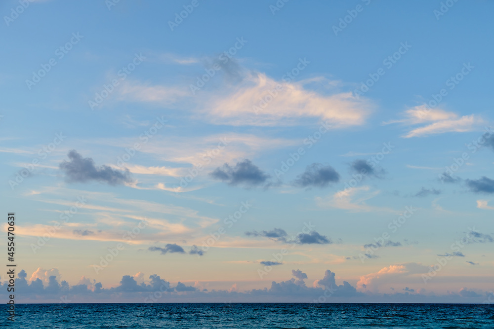 Beautiful colored cloudy evening sky.  Seascape.