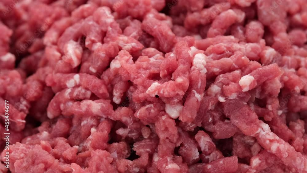 Raw minced meat close up, rotation. Meat cooking concept. 4K UHD video Raw minced meat close up, rotation. Meat cooking concept. 4K UHD video