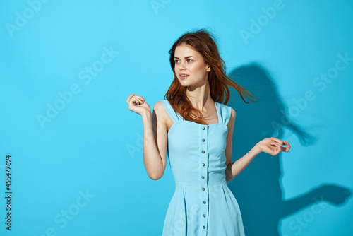 woman in a blue dress posing Studio fun model