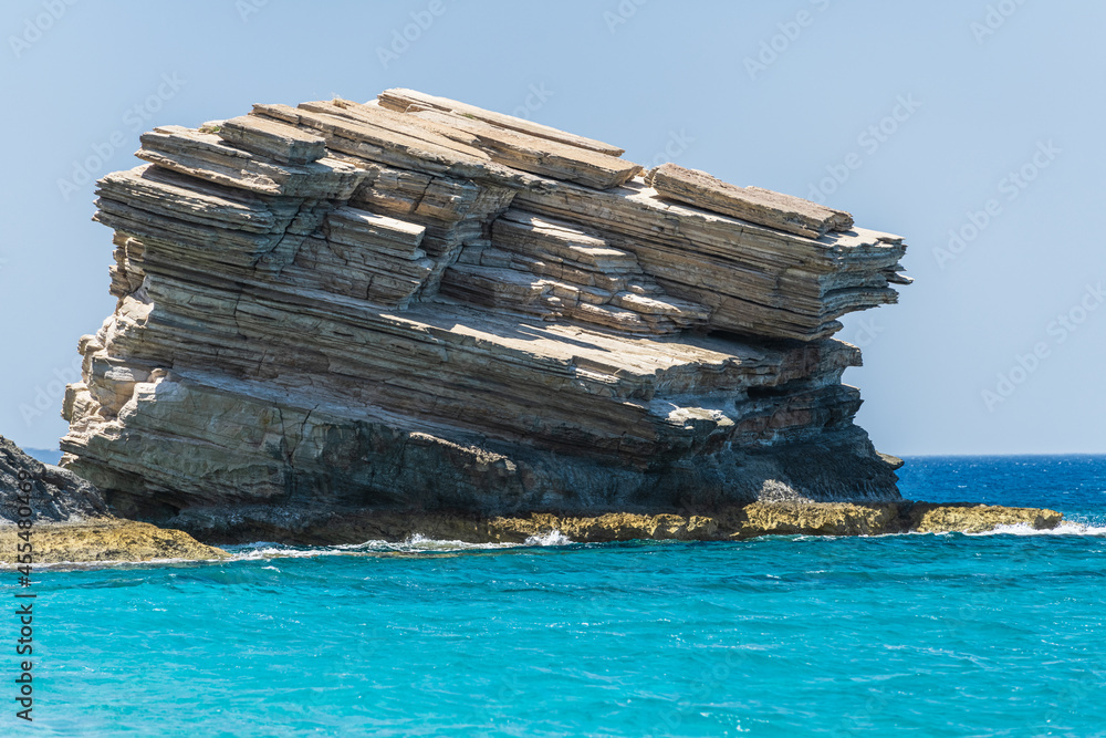 Triopetra Beach with a lot of big rocks and blue water, Crete island, Greece.