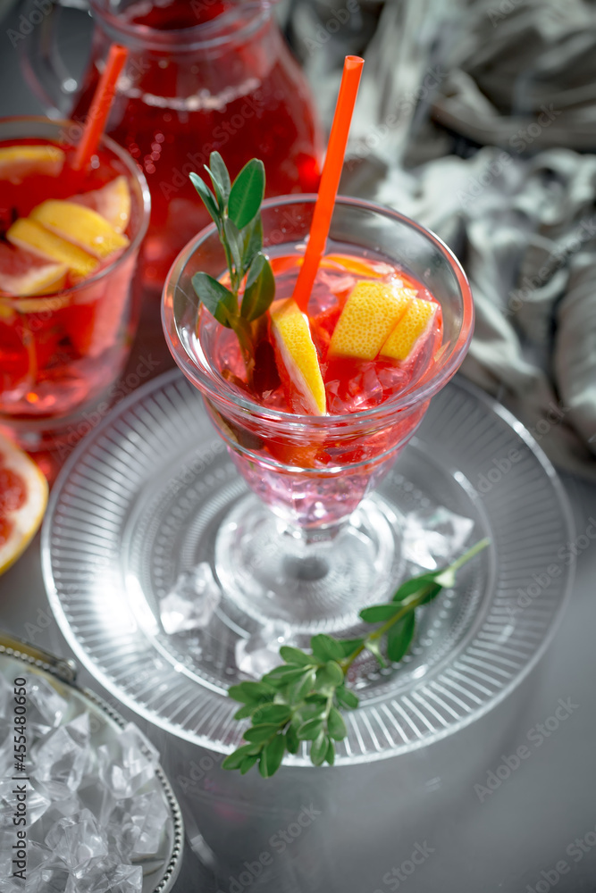 Refreshing summer alcoholic cocktail with crushed ice and citrus fruits Refreshing summer alcoholic cocktail with crushed ice and citrus fruits