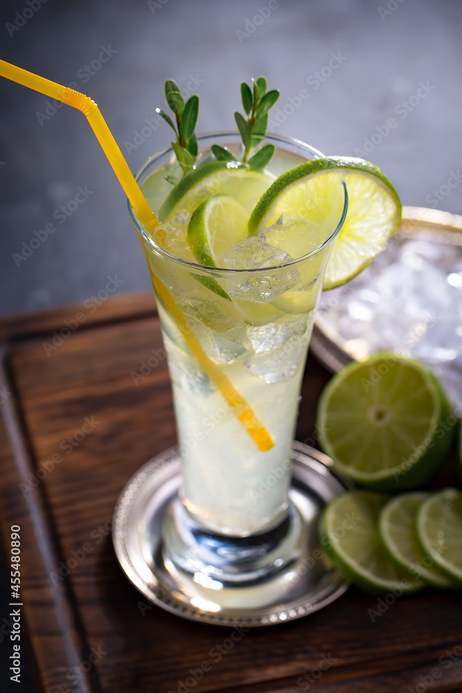 Fruit cocktail, in a glass with natural healthy fruits on a table with kitchen accessories. Fruit cocktail, in a glass with natural healthy fruits on a table with kitchen accessories.