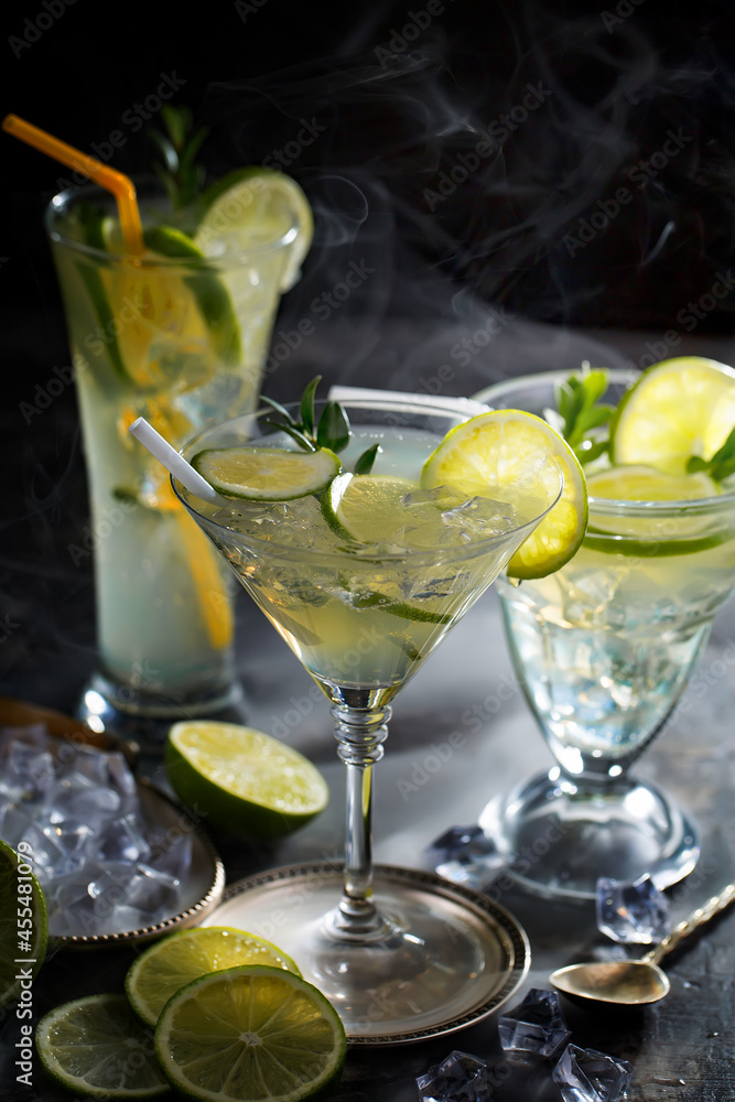 Fototapeta premium Refreshing summer alcoholic cocktail with crushed ice and citrus fruits