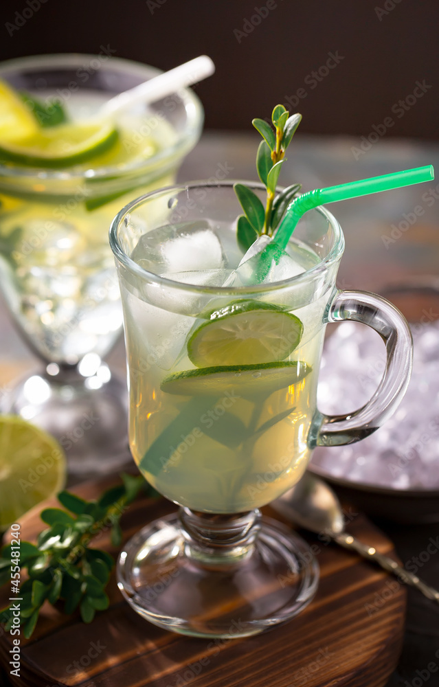 Fruit cocktail, in a glass with natural healthy fruits on a table with kitchen accessories. Fruit cocktail, in a glass with natural healthy fruits on a table with kitchen accessories.