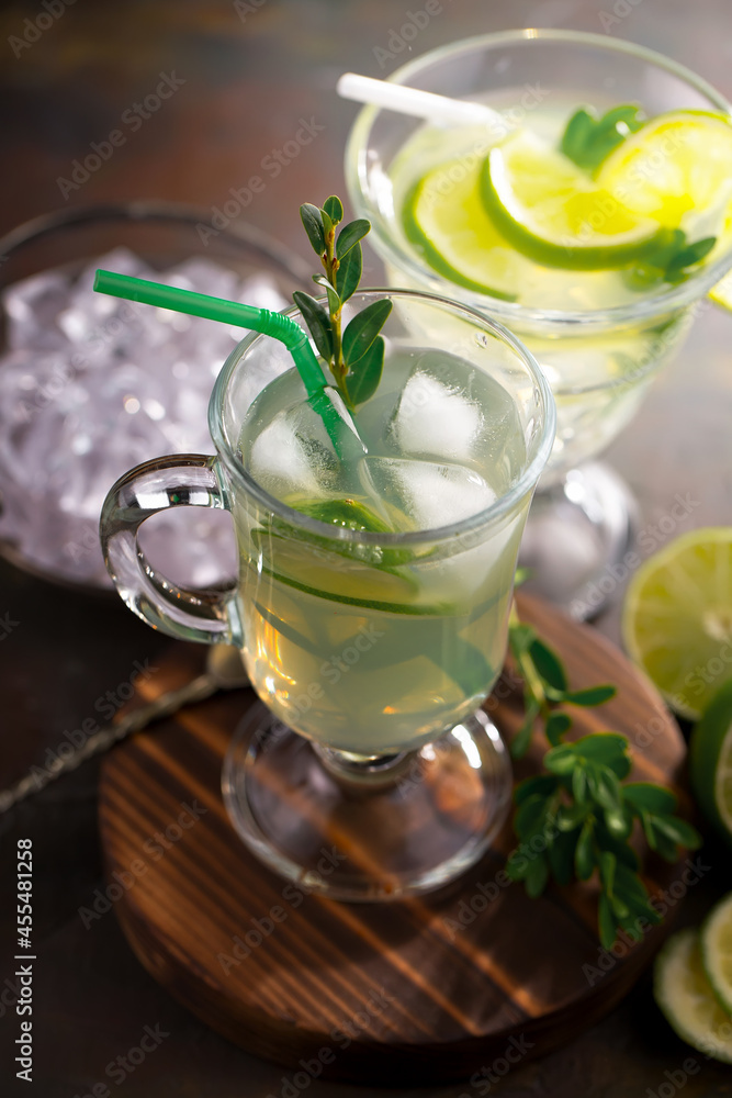 Fruit cocktail, in a glass with natural healthy fruits on a table with kitchen accessories. Fruit cocktail, in a glass with natural healthy fruits on a table with kitchen accessories.