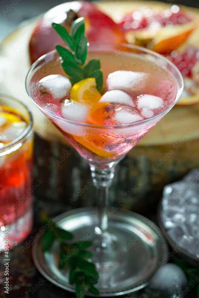 Fruit cocktail, in a glass with natural healthy fruits on a table with kitchen accessories. Fruit cocktail, in a glass with natural healthy fruits on a table with kitchen accessories.