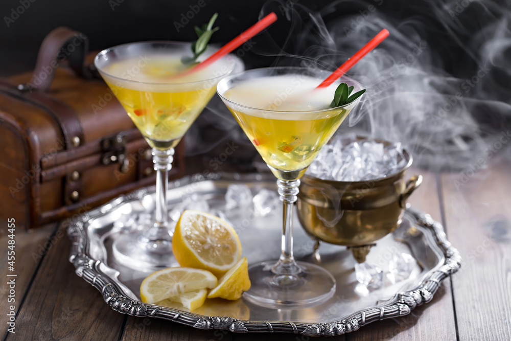 Fruit cocktail, in a glass with natural healthy fruits on a table with kitchen accessories. Fruit cocktail, in a glass with natural healthy fruits on a table with kitchen accessories.