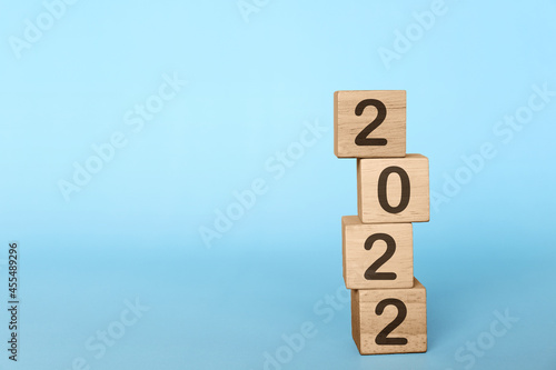 New year concept, Figures of the year 2022 on a wooden block