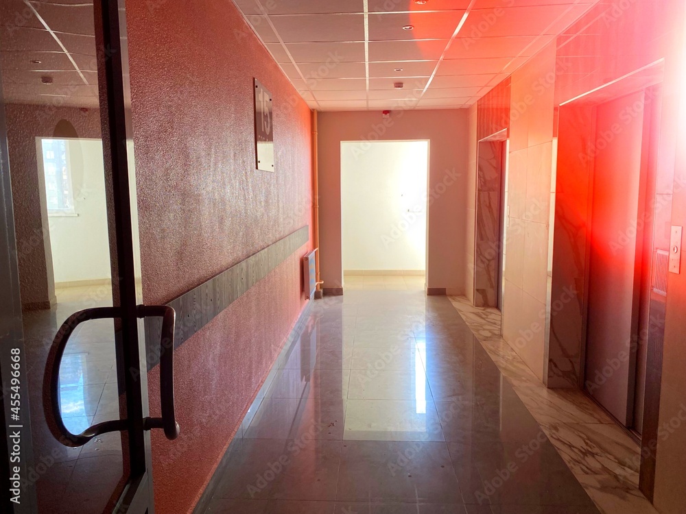 The interior of the entrance to an apartment building. Office building interior The interior of the entrance to an apartment building. Office building interior