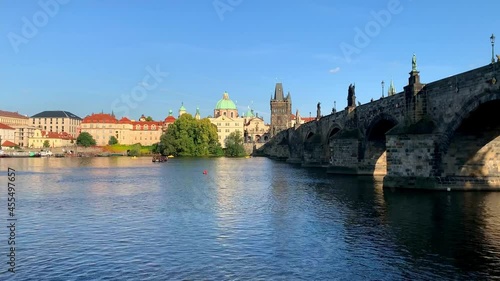 View on Charles bridge or Karluv most over Vltava river in sunny summer day, Prague