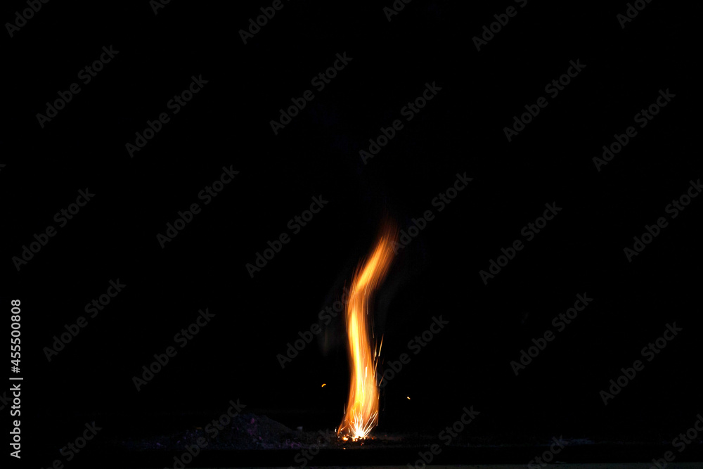 fire flame with reflection in the glass on a black background fire flame with reflection in the glass on a black background