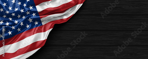 Close Up of American flag on the black wooden background 3D render