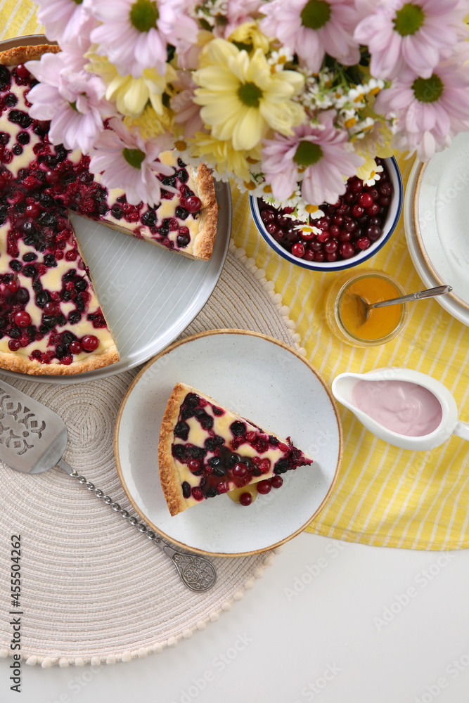Delicious currant pie and fresh berries on white table, flat lay Delicious currant pie and fresh berries on white table, flat lay