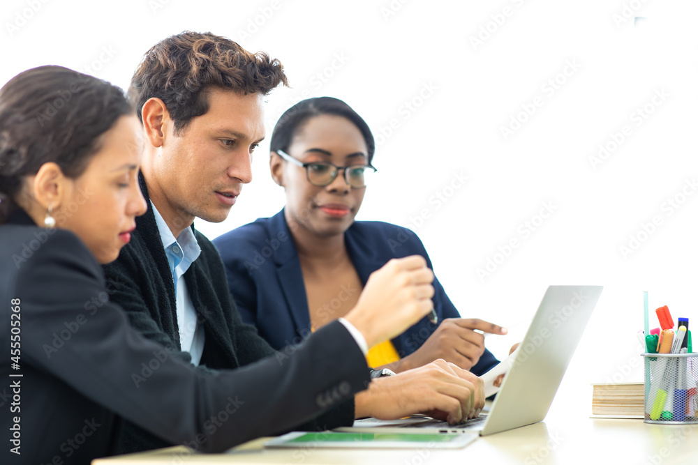 Business man manager leader in meeting with two woman analyzing ducuments on laptop computer in home office. Business man manager leader in meeting with two woman analyzing ducuments on laptop computer in home office.