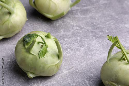 Whole ripe kohlrabi plants on grey table