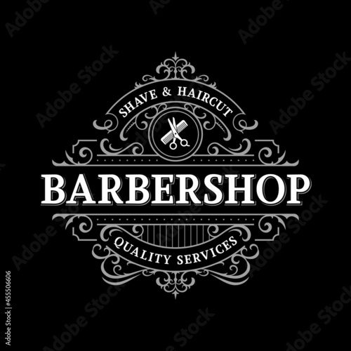 Barbershop ornate vintage victorian typography logo design with decorative ornamental flourish frame