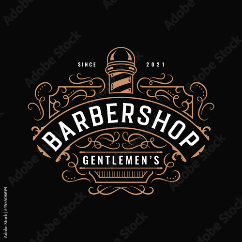 Barbershop vintage western typography logo design with decorative ornamental flourish frame