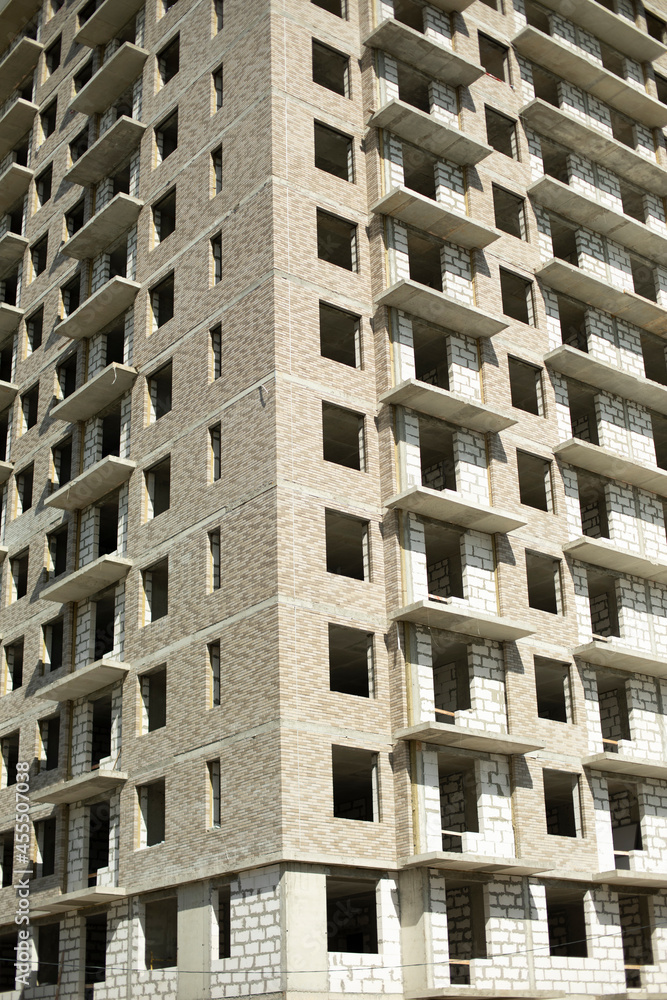 Construction of the building. Unfinished house. Concrete structure. Construction of the building. Unfinished house. Concrete structure.