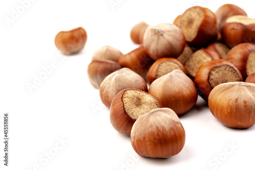 Group of hazelnuts, isolated on white background