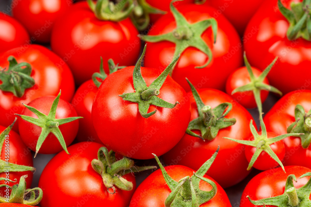 Red tomatoes background. Fresh vegetables
