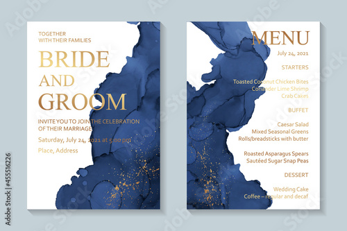 Modern watercolor background or elegant card design for birthday invite or wedding or menu with abstract dark blue ink waves and golden splashes on a white.