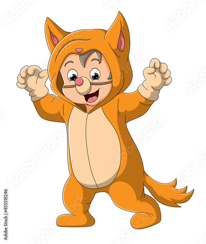 The cute boy is wearing the cat costume and scare the people
