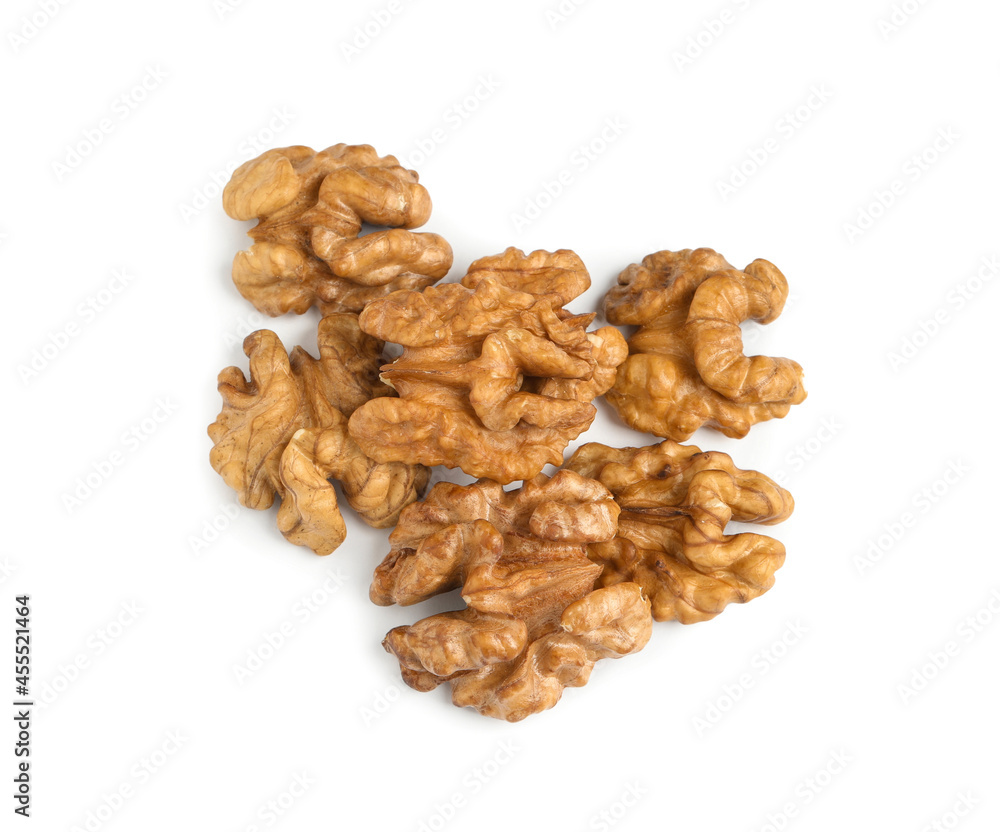 Pile of peeled walnuts on white background, top view Pile of peeled walnuts on white background, top view