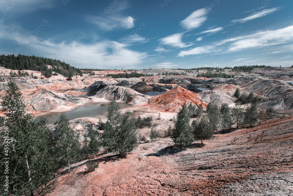 Fototapeta premium Red Martian landscape in the Podzhukovo quarry in the Sverdlovsk region